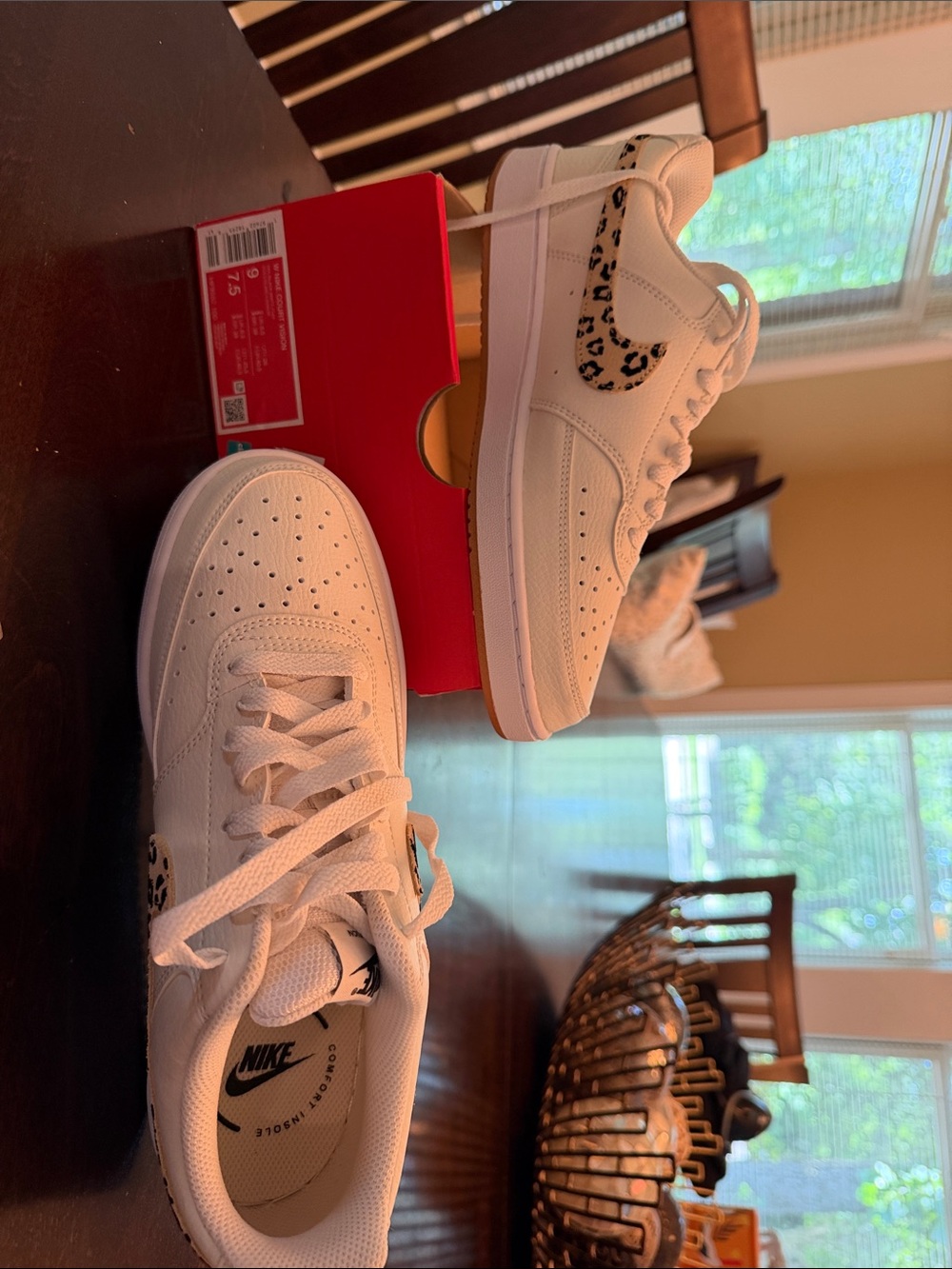 Nike White Low-Top Sneakers with Leopard Swoosh Accent